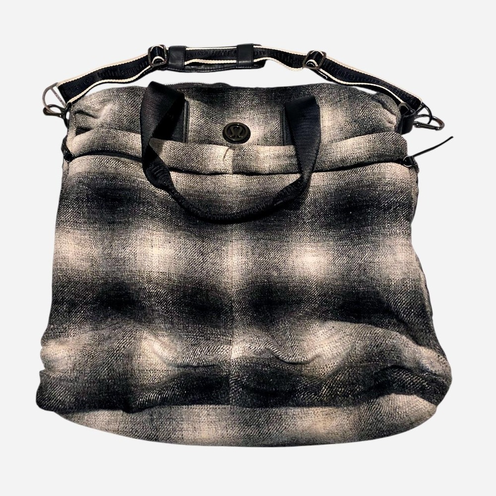 Lululemon black and gray plaid tote bag with distressed leather handles